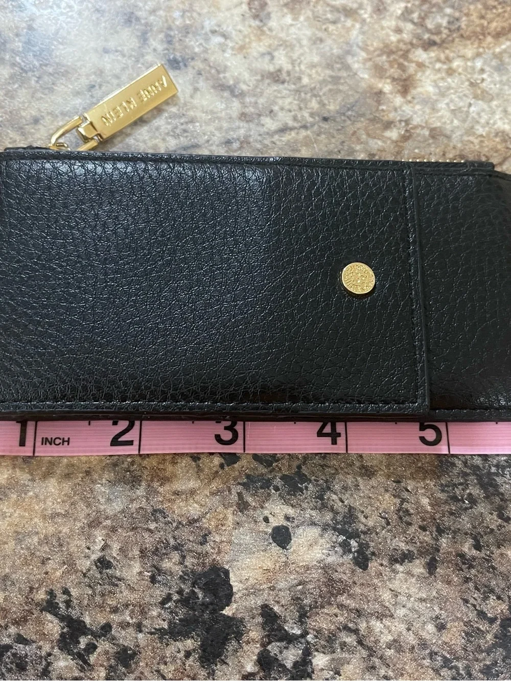 Anne Klein black pebble leather zip wristlet with gold hardware